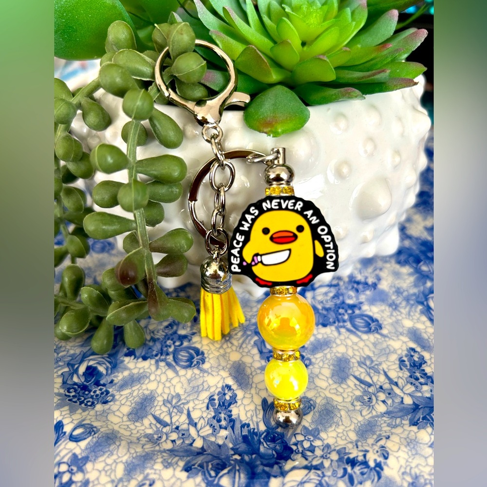 Peace was never an option bag, charm keychain